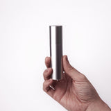 Überlube Good-to-Go case shown in hand for scale