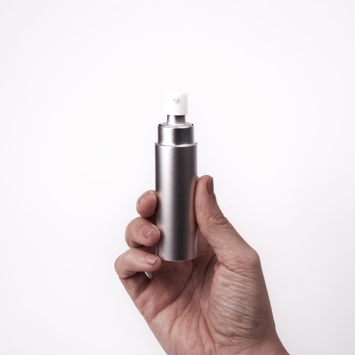 Überlube Good-to-Go travel lubricant held in hand